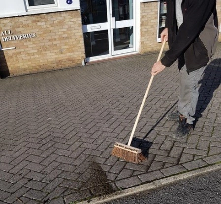 SWEEPING hard surfaces as an effective weed control solution. - Cover Image