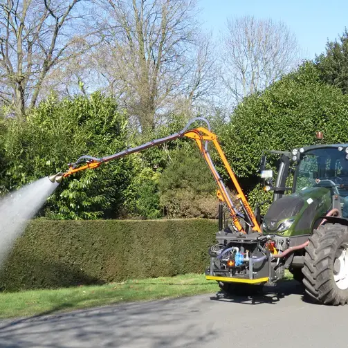 Tractor mounted watering arm